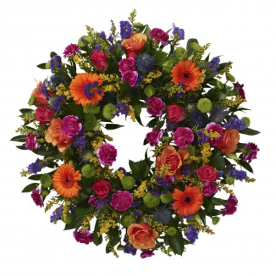 Florist’s Choice Funeral Wreath - A thoughtful funeral wreath, lovingly created using the freshest seasonal blooms to provide a beautiful and respectful tribute.